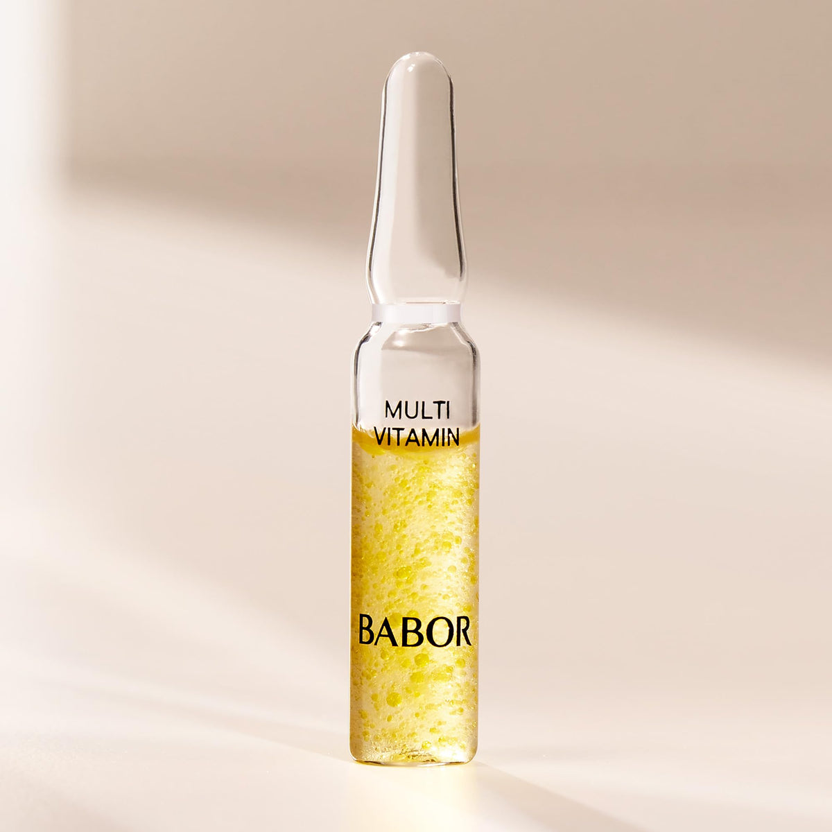 BABOR ampoule on bathroom vanity suggesting daily skincare ritual
