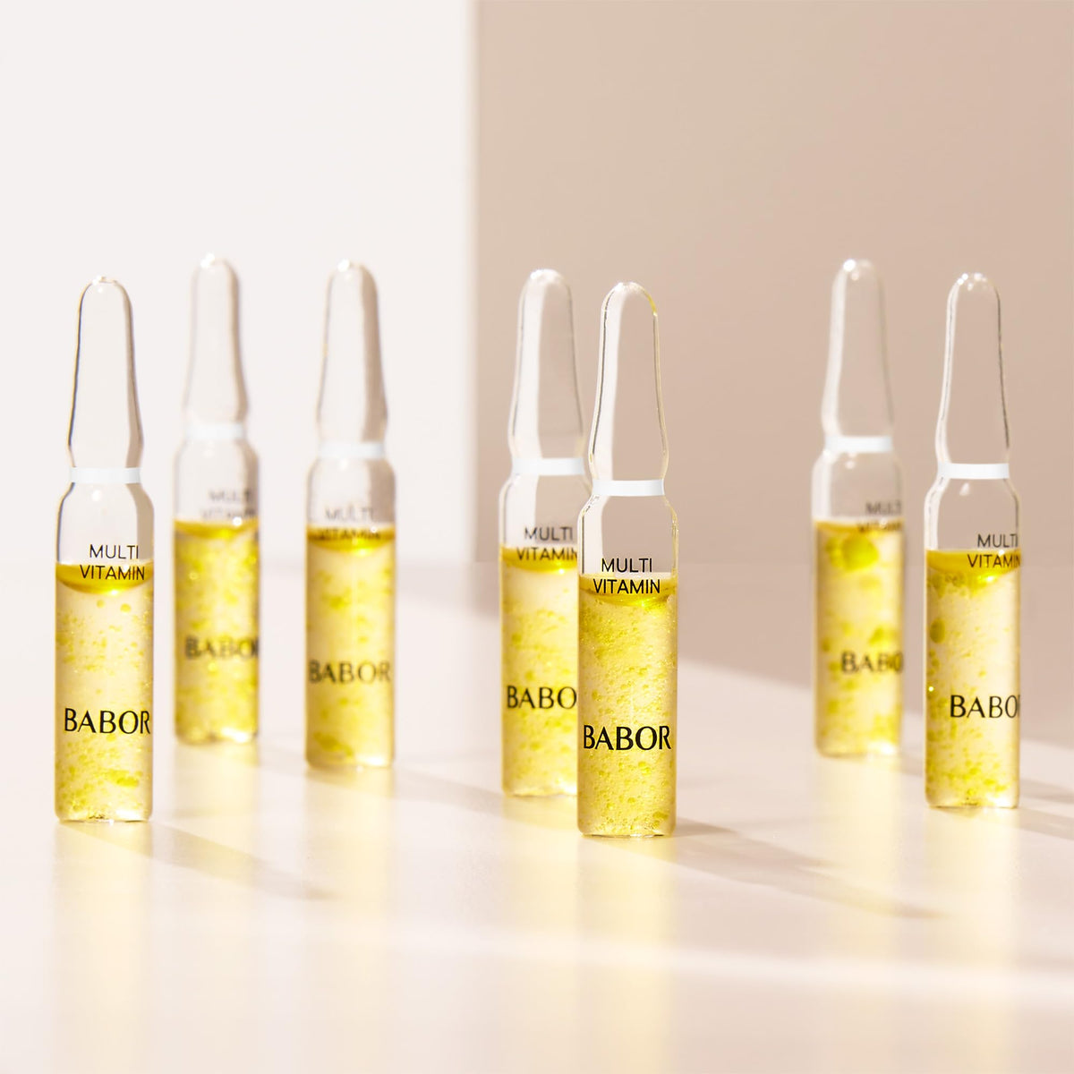 BABOR ampoule next to hand showing compact single-dose size
