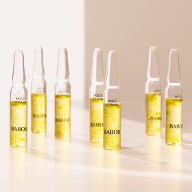 BABOR ampoule next to hand showing compact single-dose size