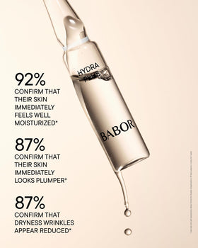 BABOR single ampoule opened with serum pour for immediate hydration benefit