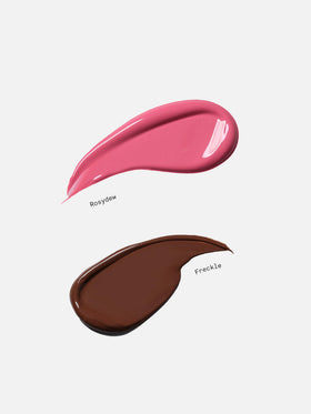 Baby Go Dewy next to finger showing size and easy one-hand application