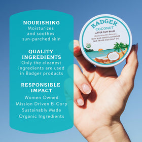 Applying Badger coconut AfterSun balm to a shoulder to demonstrate soothing post-sun application