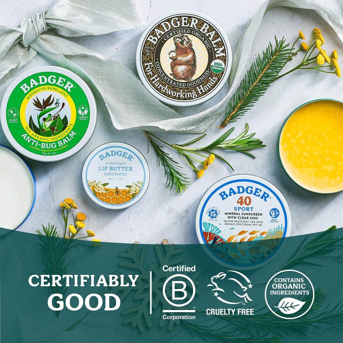 Badger balm beside gardening tools showing restoration benefit for hands