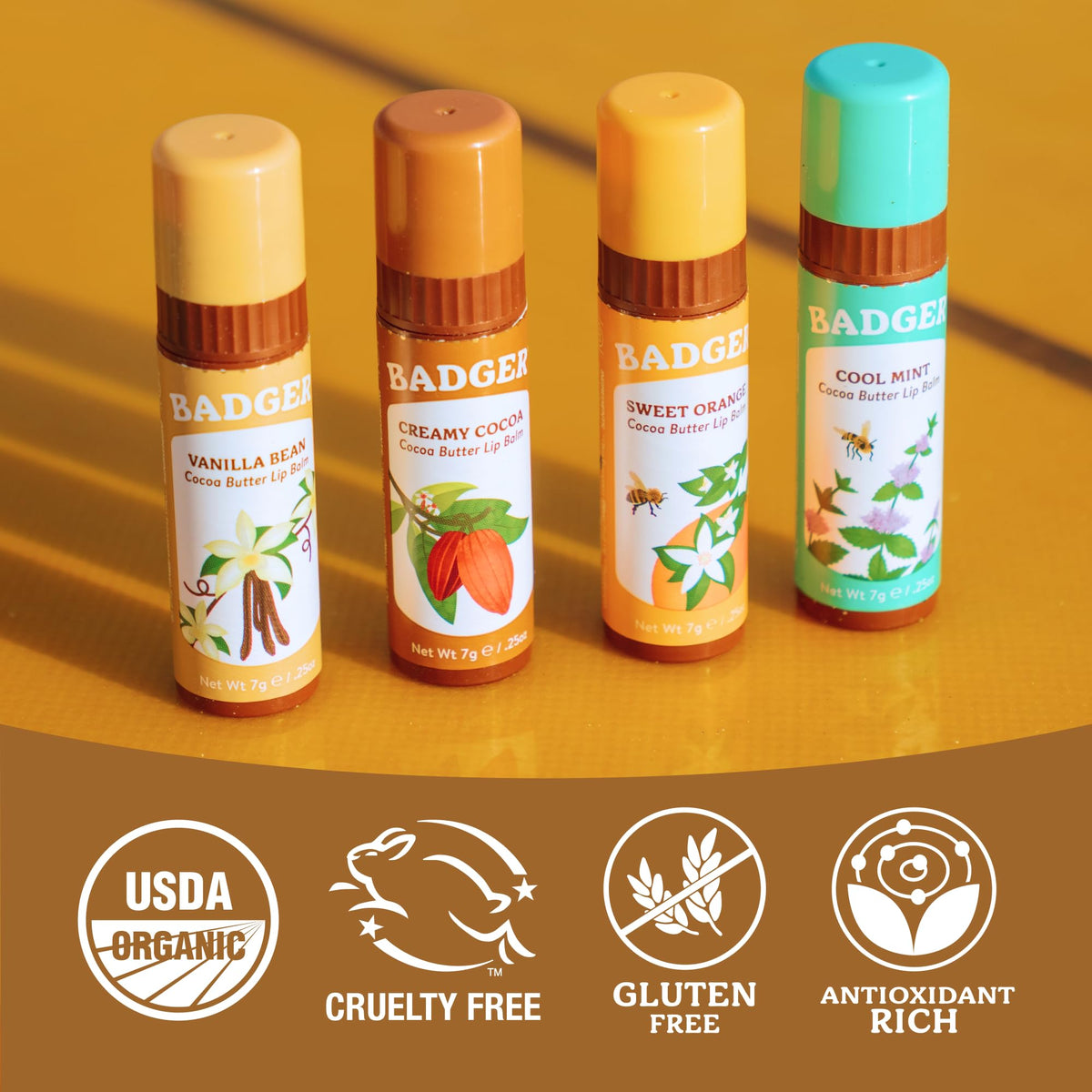 Badger jumbo stick next to standard lip balm illustrating larger size and value