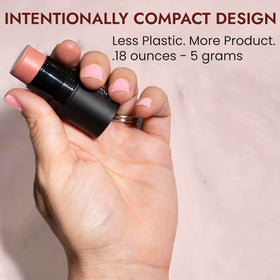 BaeBlu held in hand to show compact travel-friendly size