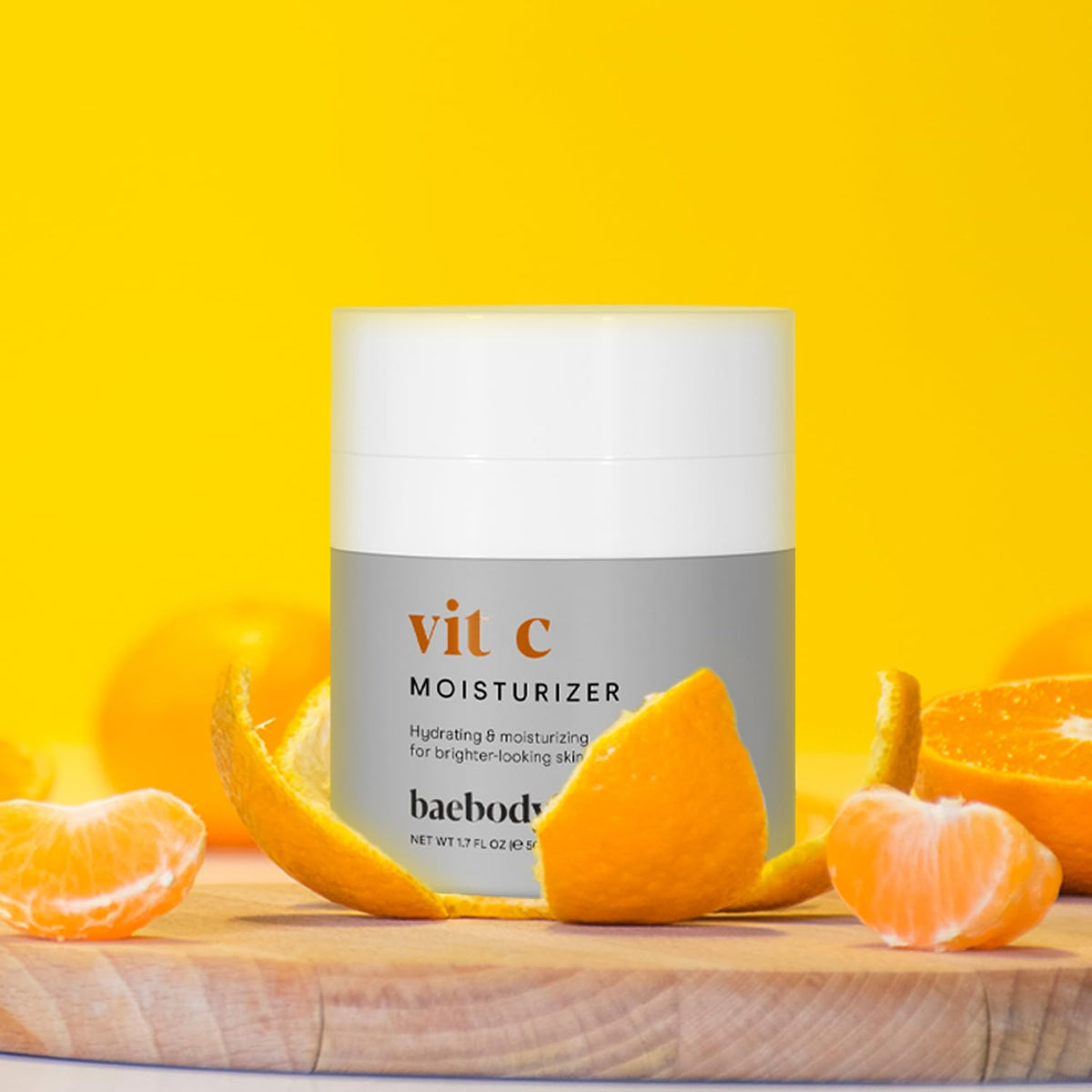 Baebody applying cream to face demonstrating lightweight, quick absorption