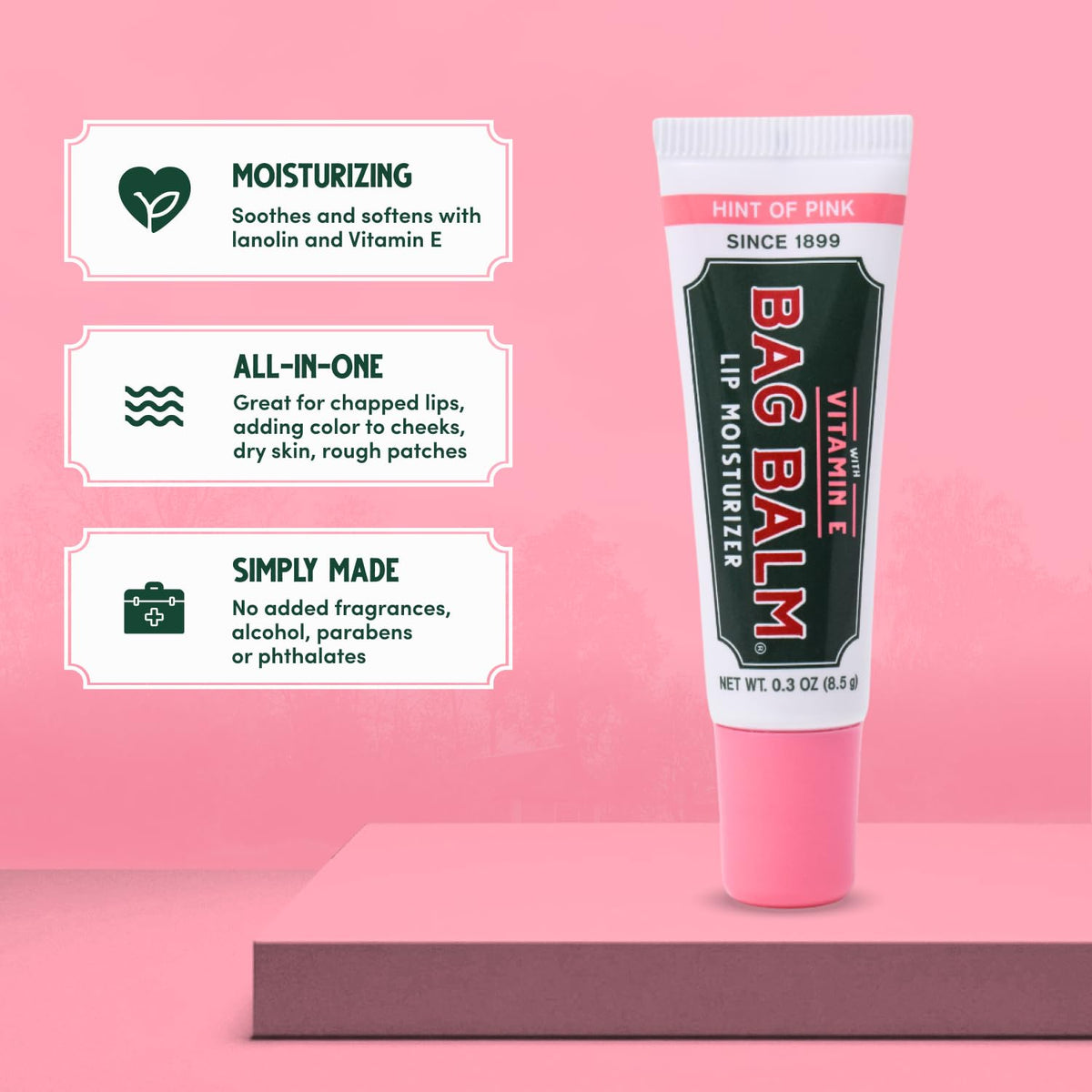 Squeezing Bag Balm onto finger to show texture and easy application benefit