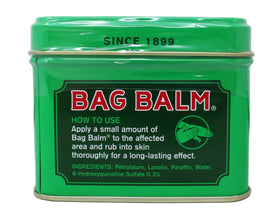 Bag Balm tin placed beside skincare items showing convenience benefit