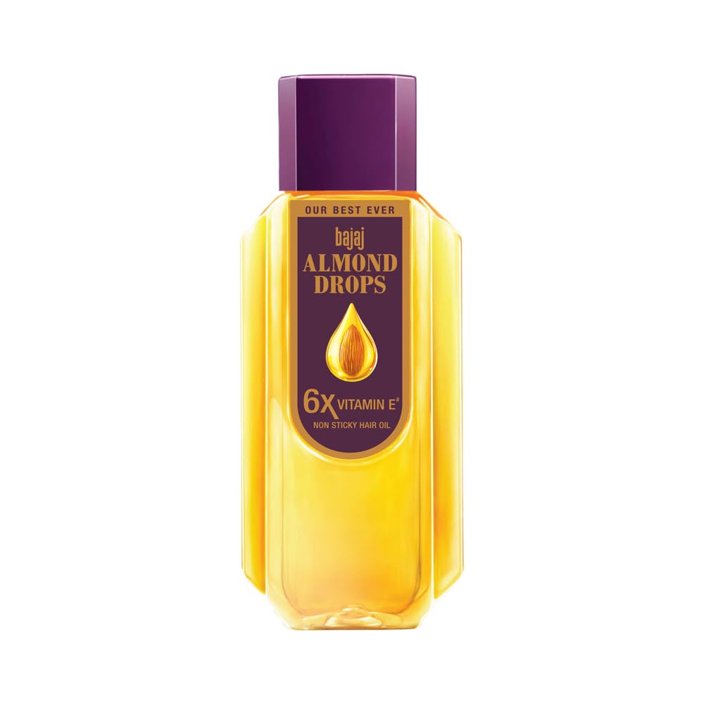 Bajaj Almond Drops bottle close-up highlighting cap and non-sticky formula benefit