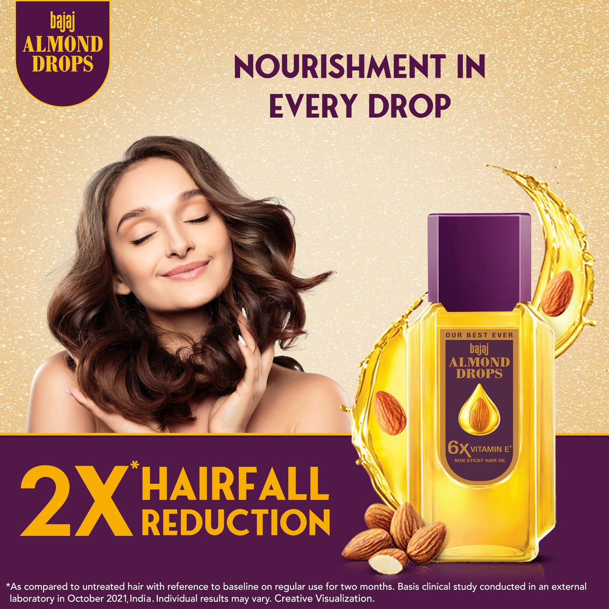 Bajaj Almond Drops pouring oil demonstrating lightweight texture for quick absorption