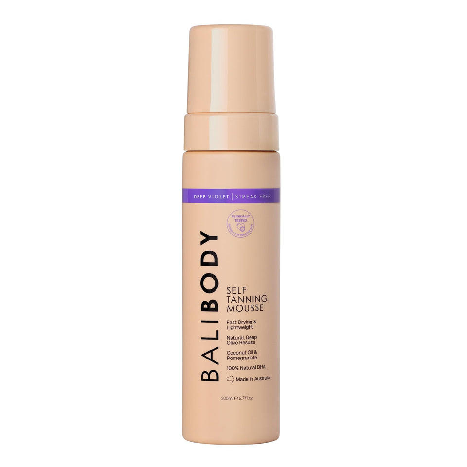 BALI BODY front packaging of deep violet tanning mousse showing bottle benefit