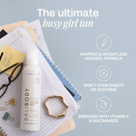 BALI BODY bottle next to hand for size and travel-friendly benefit