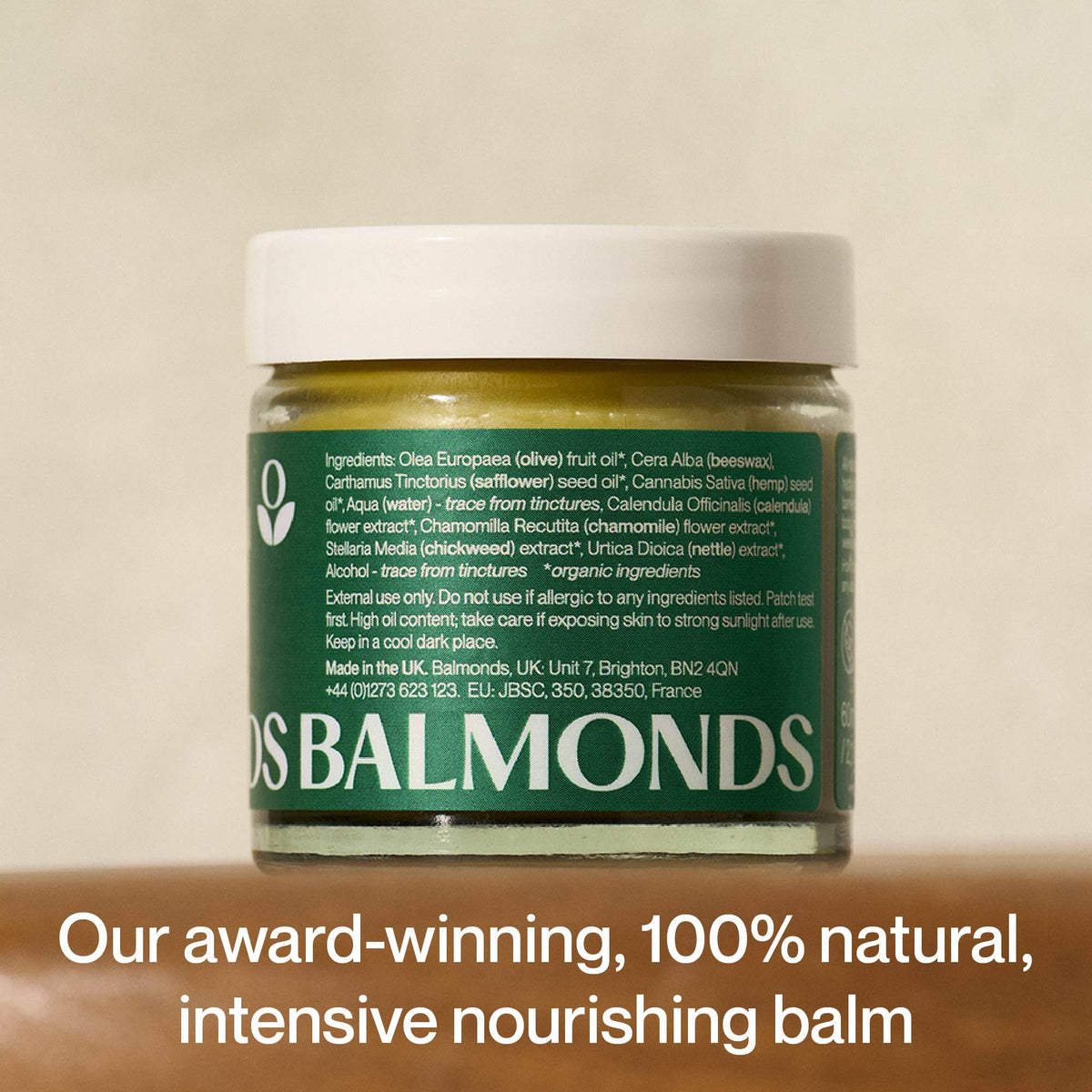 Balmonds ingredients flatlay featuring calendula hemp and beeswax for natural formulation