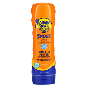 Banana Boat family at beach applying sunscreen for active outdoor safety
