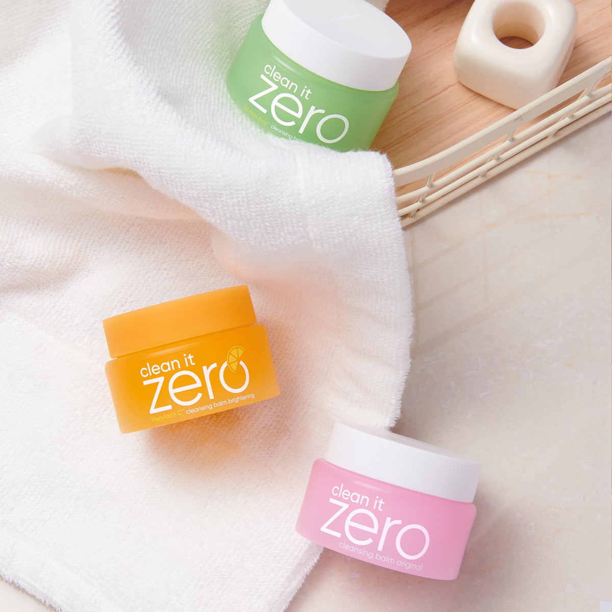 BANILA CO balm in use massaging onto dry skin to dissolve waterproof makeup
