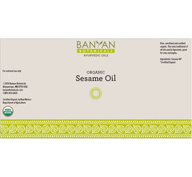 Banyan Botanicals oil golden stream close-up showing natural cold-pressed texture