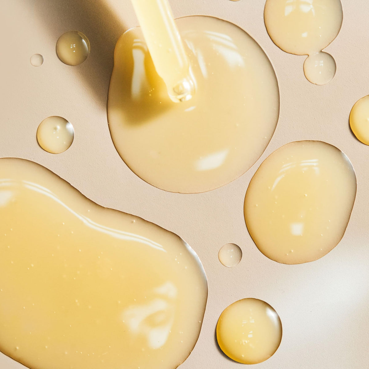 Barefaced Liquid Gold serum on skin demonstrating quick absorption and glow benefit