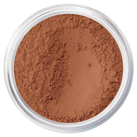 bareMinerals bronzer beside coin for size reference and travel-friendly benefit