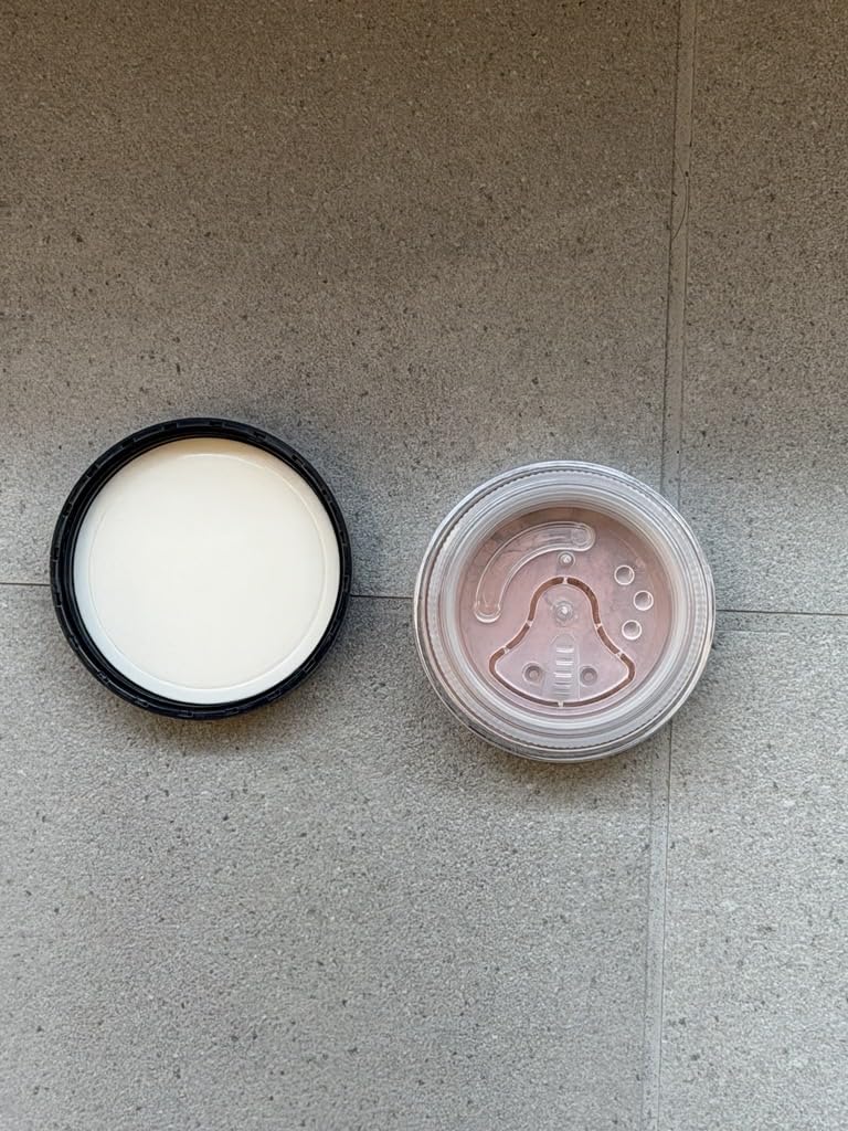 bareMinerals brush applying blush for buildable, natural color