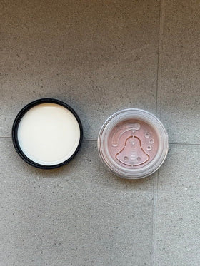 bareMinerals brush applying blush for buildable, natural color
