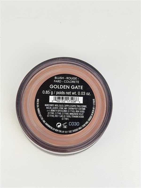 bareMinerals jar in hand showing size and portable convenience