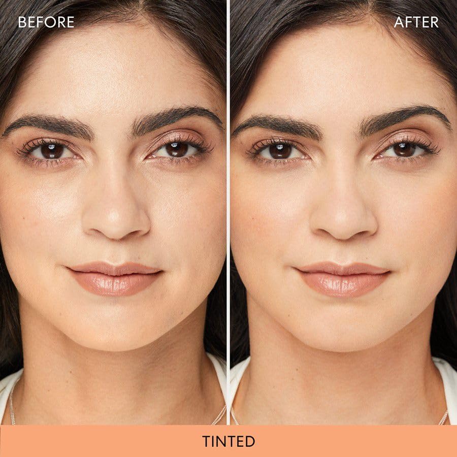 bareMinerals brush applying powder to T-zone for oil control
