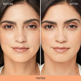 bareMinerals brush applying powder to T-zone for oil control
