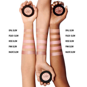 bareMinerals swatch on arm displaying peach glow shade and sheer luminous payoff