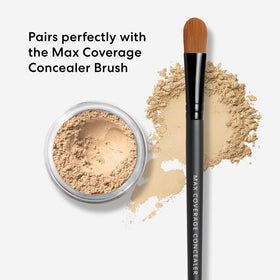 bareMinerals jar held in hand showing compact size and portability