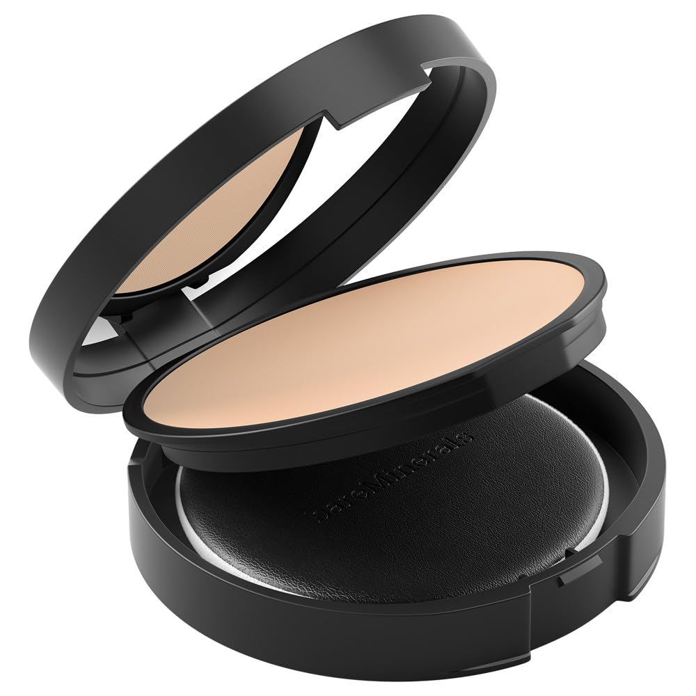 bareMinerals compact held in hand to show scale and travel-friendly convenience