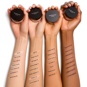 bareMinerals jar in hand size comparison showing travel-friendly convenience benefit