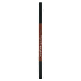 bareMinerals pencil next to hand shows compact size and travel benefit