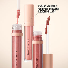 bareMinerals tube beside a coin to show compact size and travel-friendly convenience