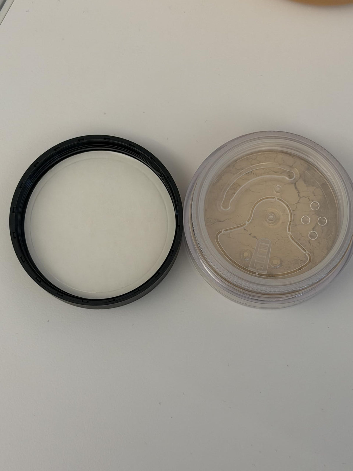 bareMinerals travel set with mirror showing portability and on-the-go touch-up benefit