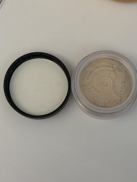 bareMinerals travel set with mirror showing portability and on-the-go touch-up benefit