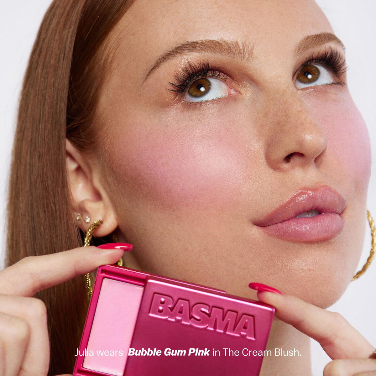 BASMA compact open with cream dab illustrating product consistency