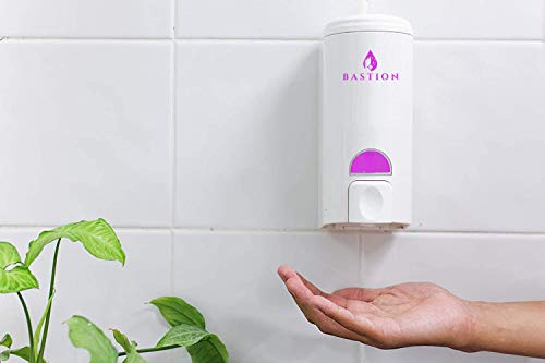 Bastion pouring soap into dispenser for easy refill and savings