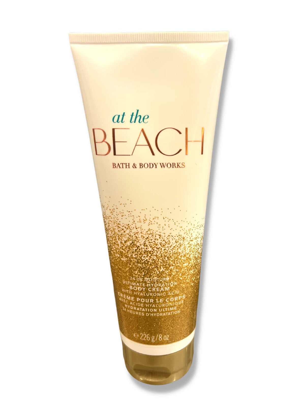 Bath & Body Works applying At The Beach on forearm for smooth, moisturized skin
