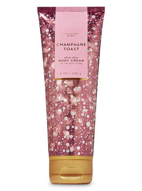 Bath & Body Works Champagne Toast set styled as a gift with ribbon showing celebratory appeal