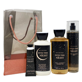 Bath & Body Works front packaging of INTO THE NIGHT gift bag showing bottles and clear bag benefits presentation