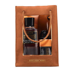 Bath & Body Works front packaging showing Mahogany Teakwood gift set benefits