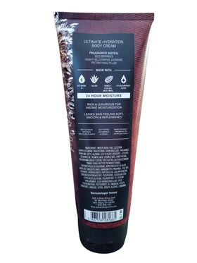 Bath & Body Works lifestyle shot applying Vampire Blood cream on forearm, demonstrating softening effect