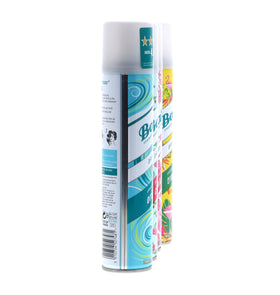 Batiste being sprayed at roots to absorb oil and add lift