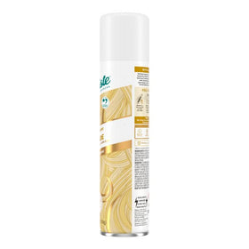 Batiste Blonde size comparison in hand indicating portable 3.81oz benefit