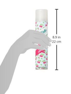 Batiste cherry lifestyle use in a bathroom bag demonstrating portability and fresh hair