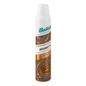 Batiste can on bathroom counter next to brush showing daily styling convenience