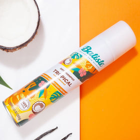Batiste in a beach bag lifestyle scene showing travel-ready refresh convenience