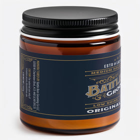 Battle Born Grooming Co pomade texture close-up displaying creamy finish for easy styling