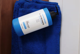 Baxter of California close label with ingredients list and product claims