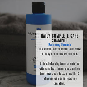 Baxter of California shampoo being used in shower, demonstrating refreshing scalp benefit